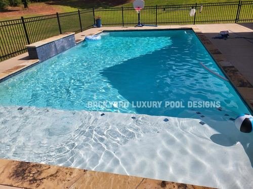 Custom pool project by Backyard Luxury Pool Designs